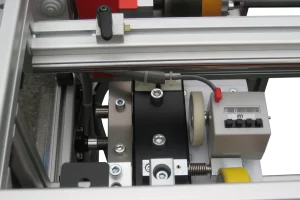 insida och mäthjul i bandtäckningsmaskin wuko master mot vit bakgrund